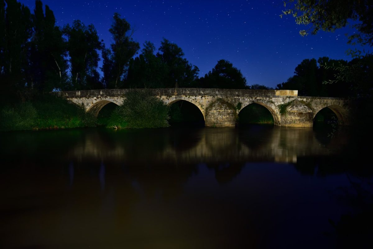 Nightscape, medieval rock bridge